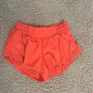 Size 4 orange Lululemon hotty hot shorts 2.5 inch
